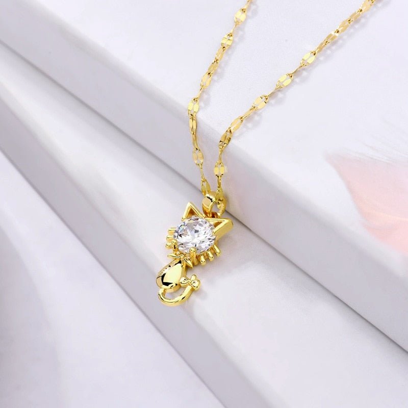 Golden cat necklace with zircon