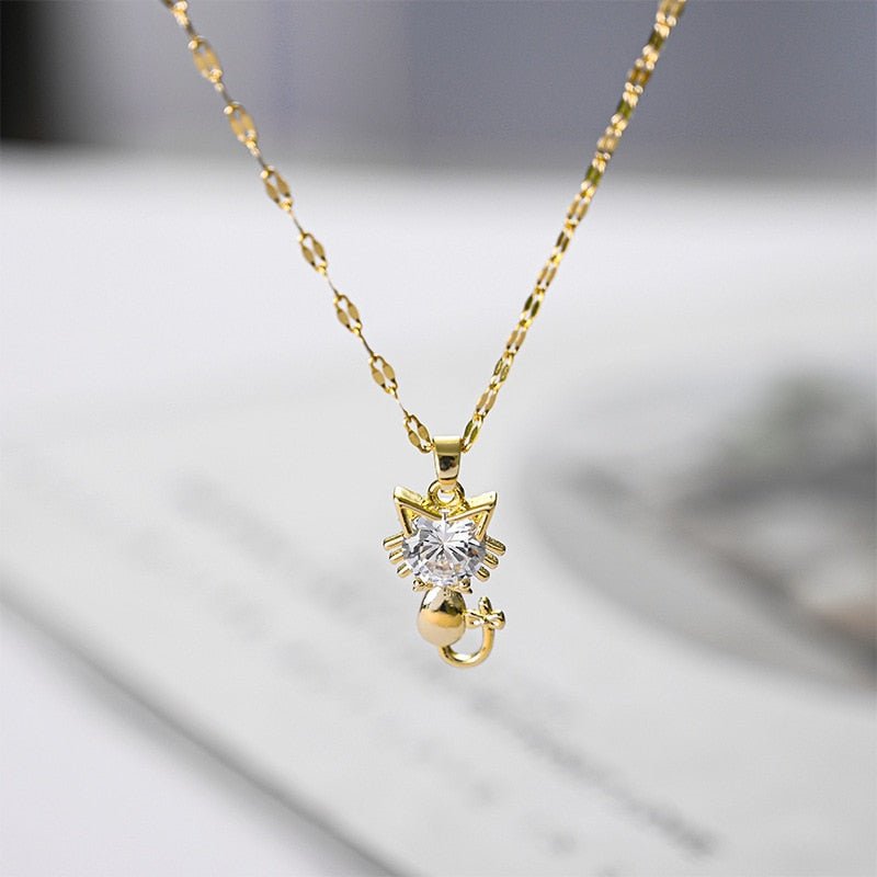 Golden cat necklace with zircon
